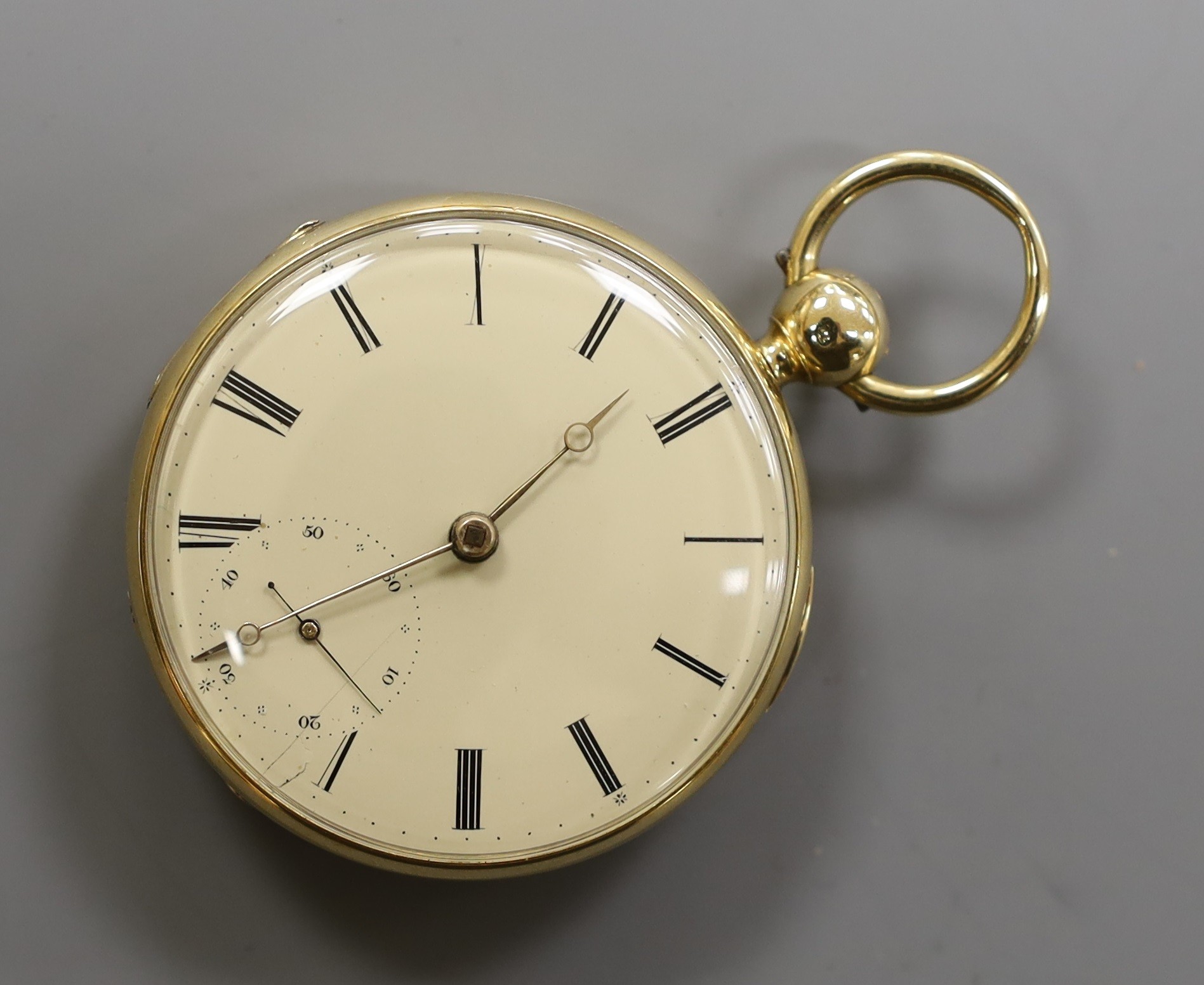 An 18ct gold open faced keywind pocket watch, by K.H. Jones, Liverpool, with Roman dial and subsidiary seconds, case diameter 46mm